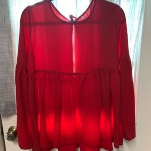 Red bell sleeve shirt